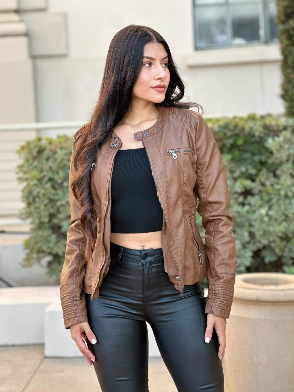 Brown hooded faux leather jacket, snap collar, zip chest pocket, long sleeves
