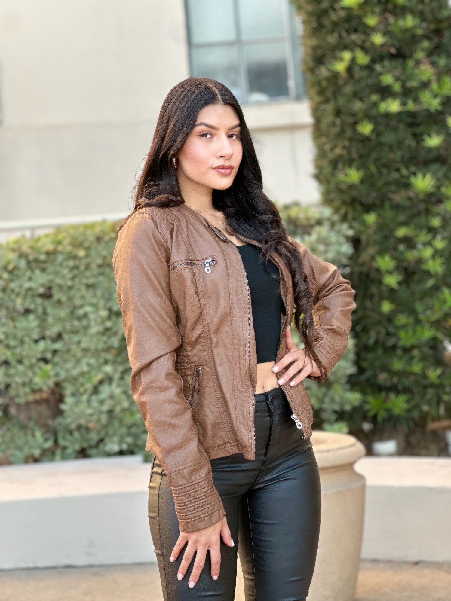 Hooded faux leather jacket in brown with snap details on the collar and front zip