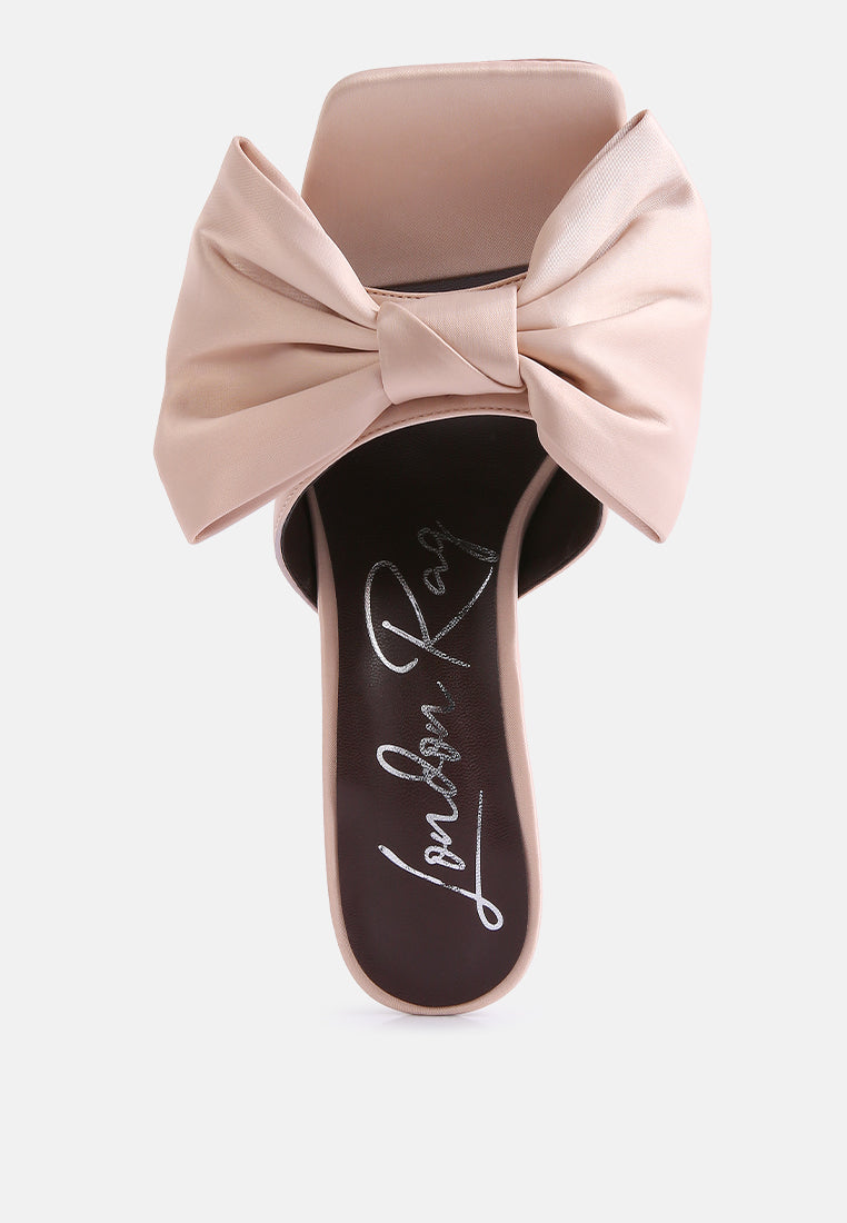 Latte bow-front slider heels with black footbed and open toe