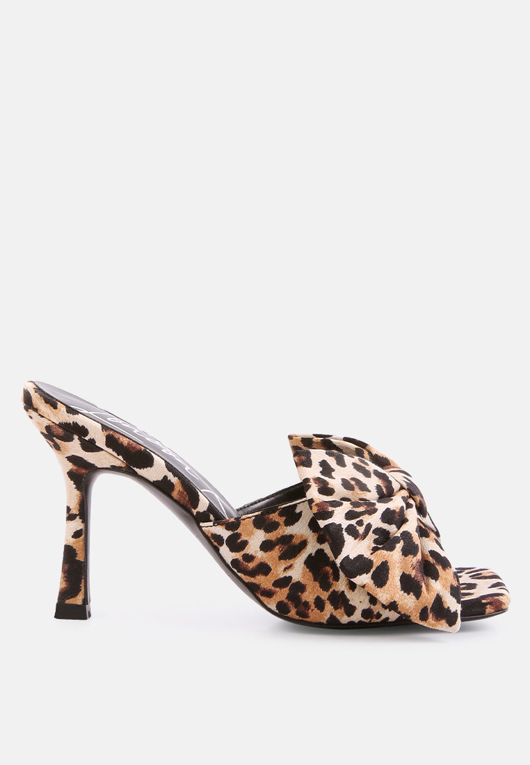Leopard print spool heel bow slider sandals, open toe and sculpted heel detail