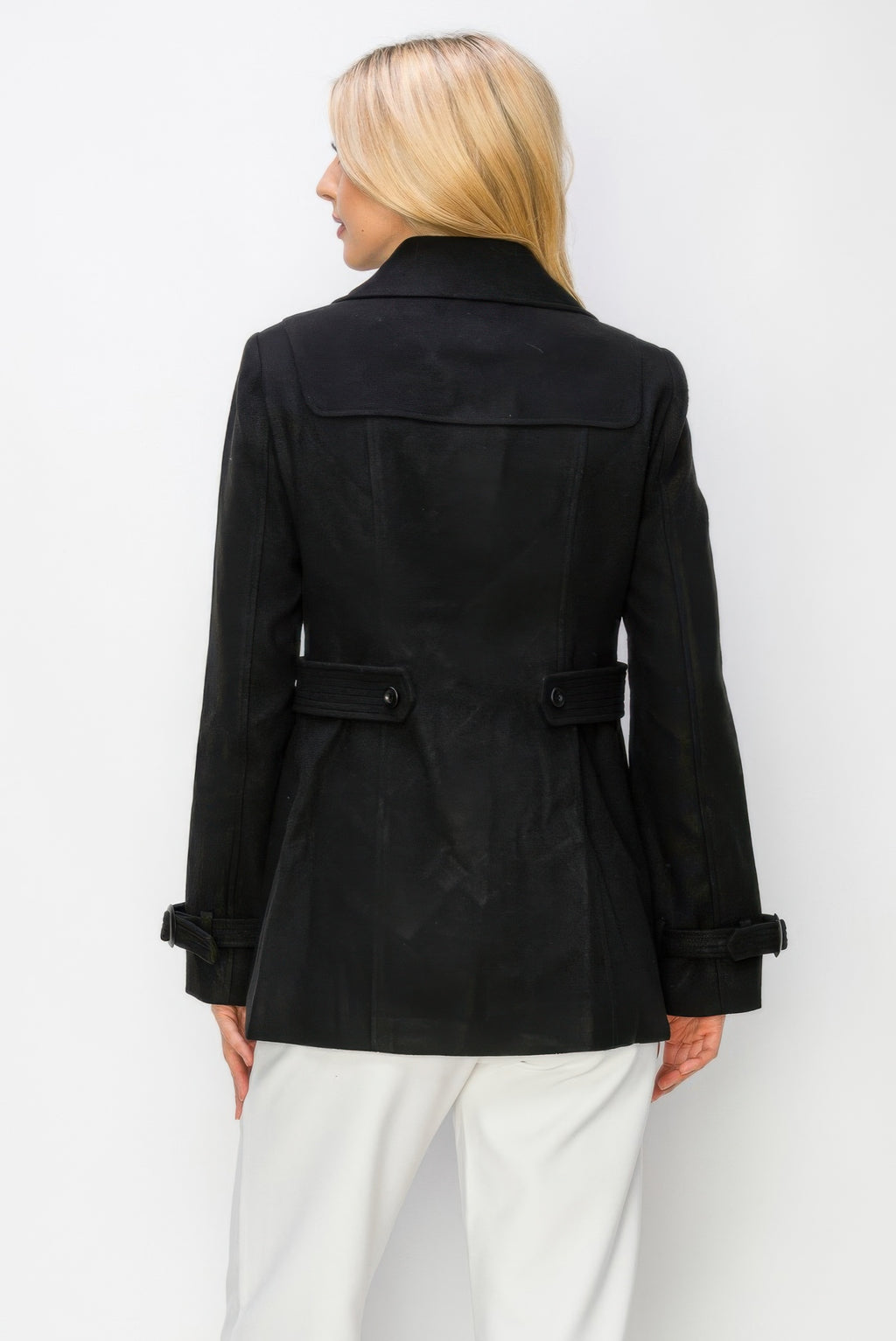 Rear view: black wool toggle peacoat with yoke panel and waist belt tabs