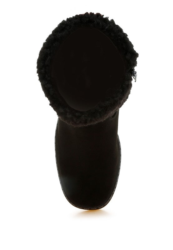 Black boot heel and toe view with fuzzy cuff lining and smooth upper seams