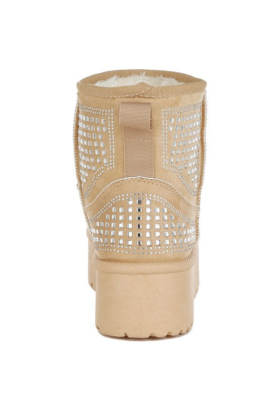 Beige ankle boots with rhinestone square detailing and pull-tab at back