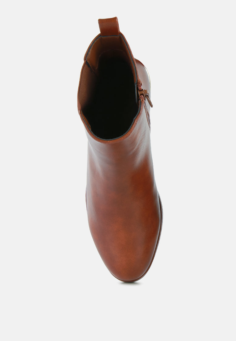 Brown ankle boots with open top showing dark interior lining