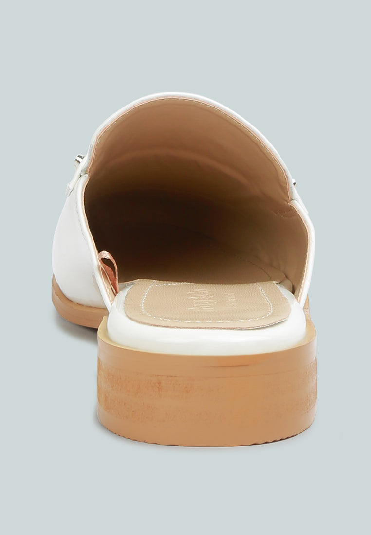 Yashta patent studded flat mules (white) open back view showing padded lining.