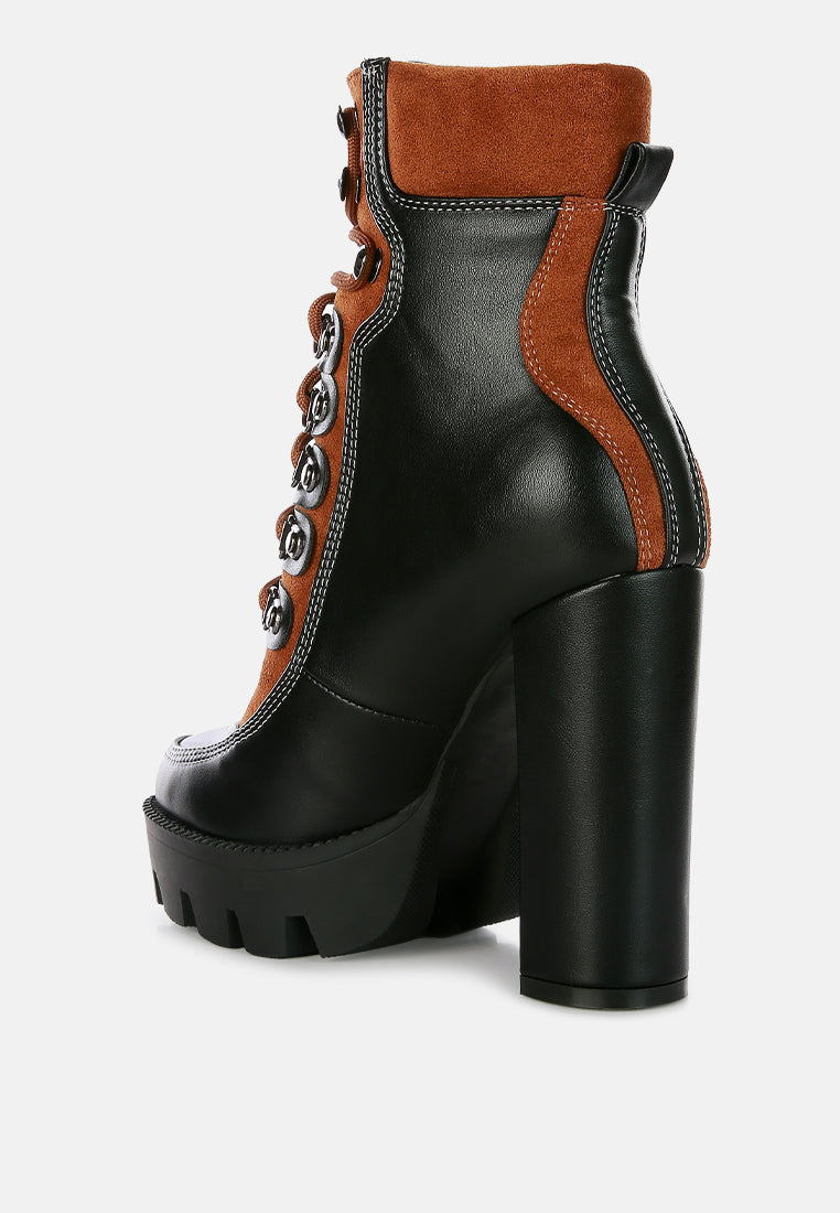Yeti black high-heel biker boots with tan side panel, chunky platform heel