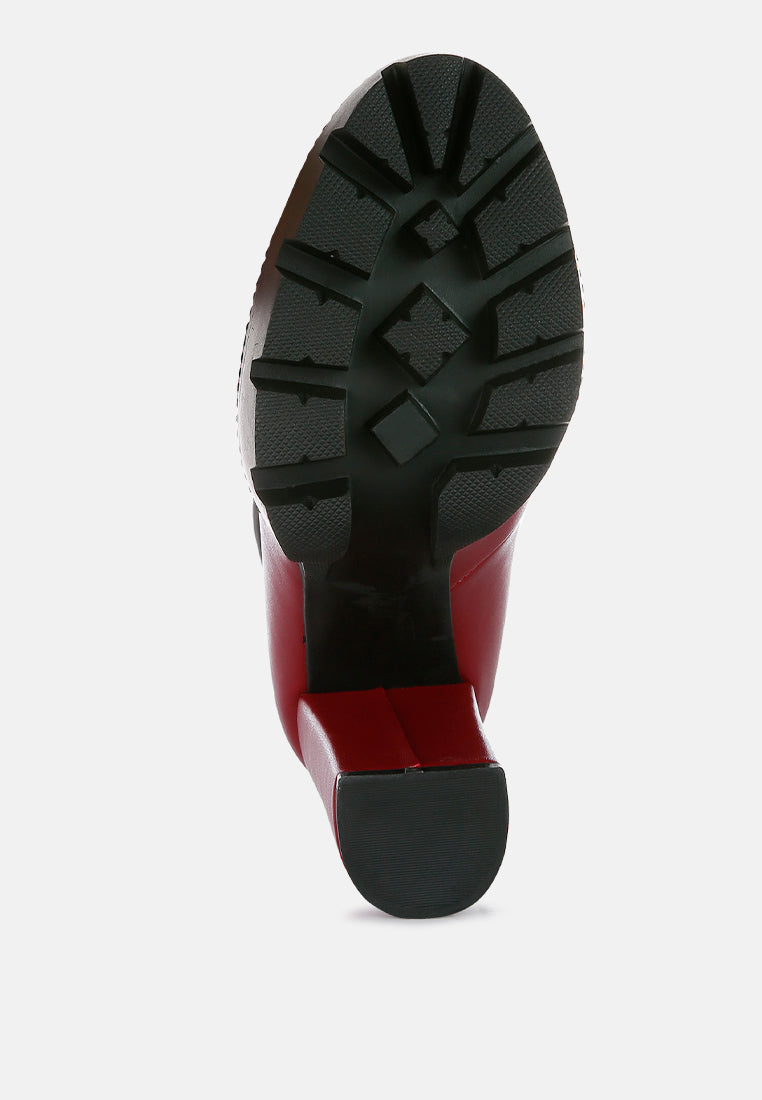 Yeti high heel lace-up biker boots, Burgundy Black outsole view with tread pattern