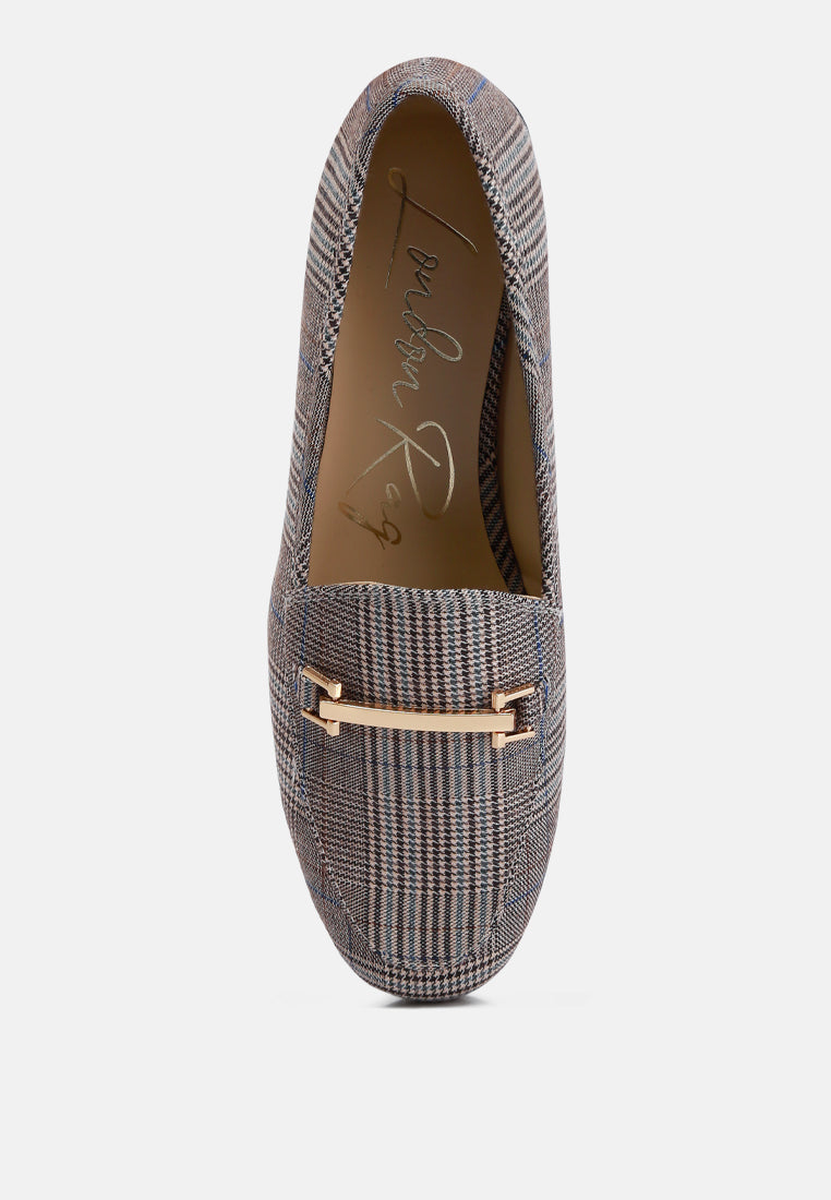 Grey plaid loafer upper close-up with horsebit strap at the vamp