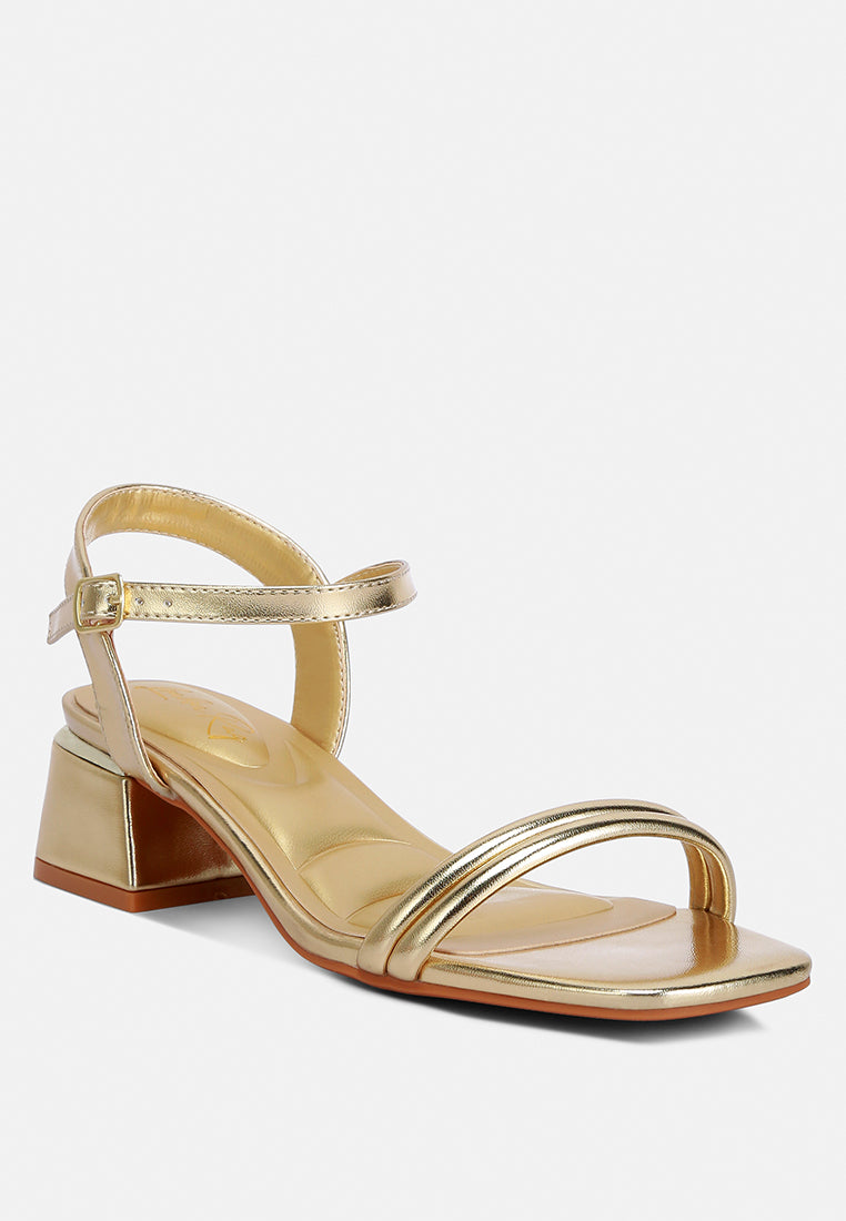 Gold metallic low block heel sandal with ankle strap and double metallic toe strap