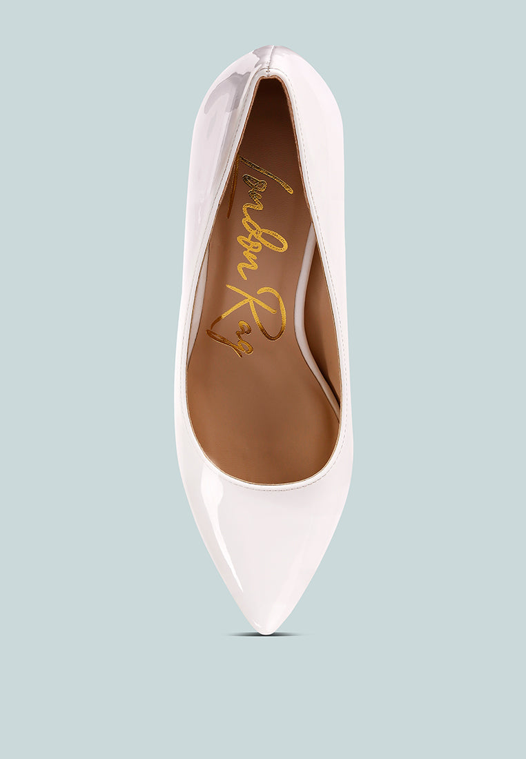 White glossy pump front view with gold script logo on inner lining