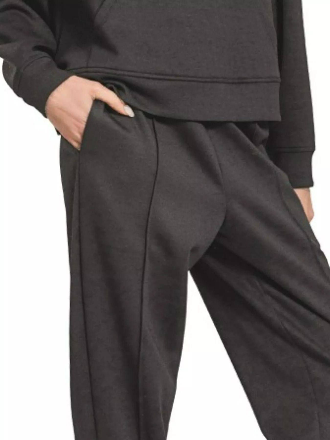 Black scuba joggers with tapered legs and side seams