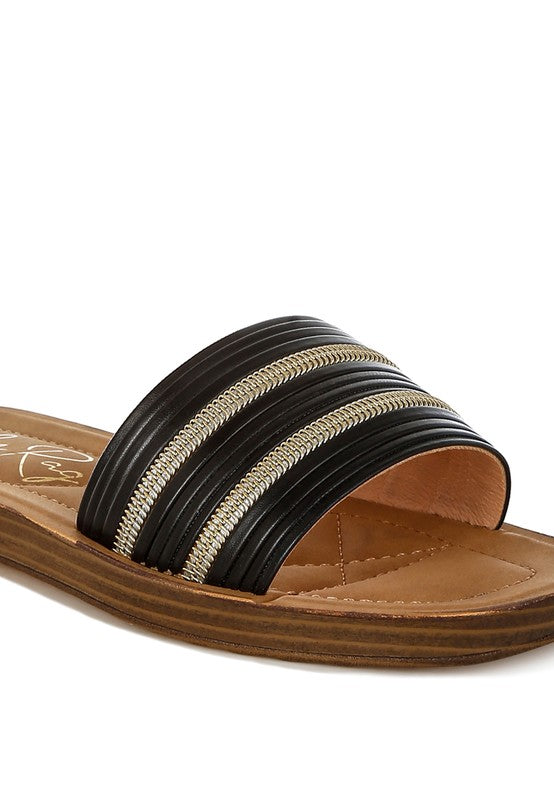 Black faux zipper stripe slide sandals with open toe and cushioned footbed