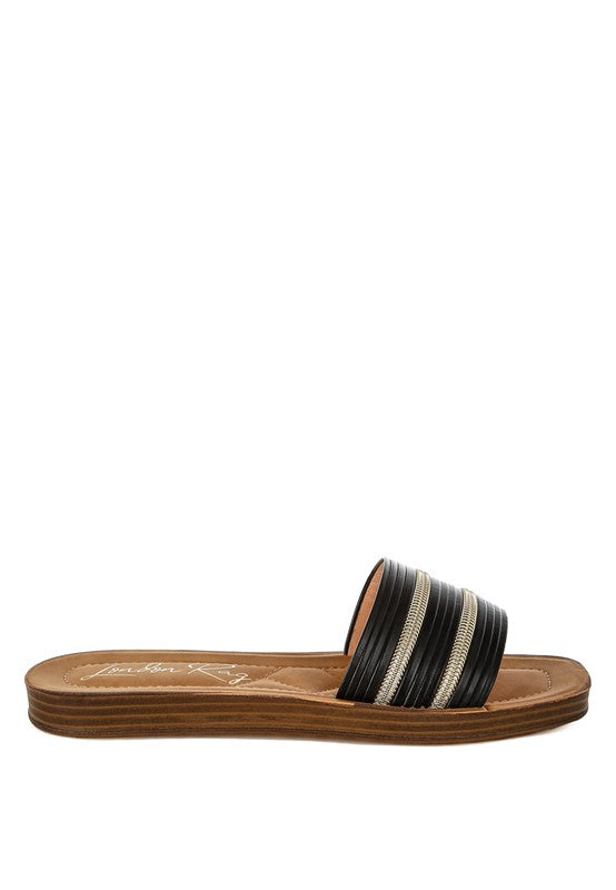 Black slip-on slide sandals with stacked faux zipper stripe straps