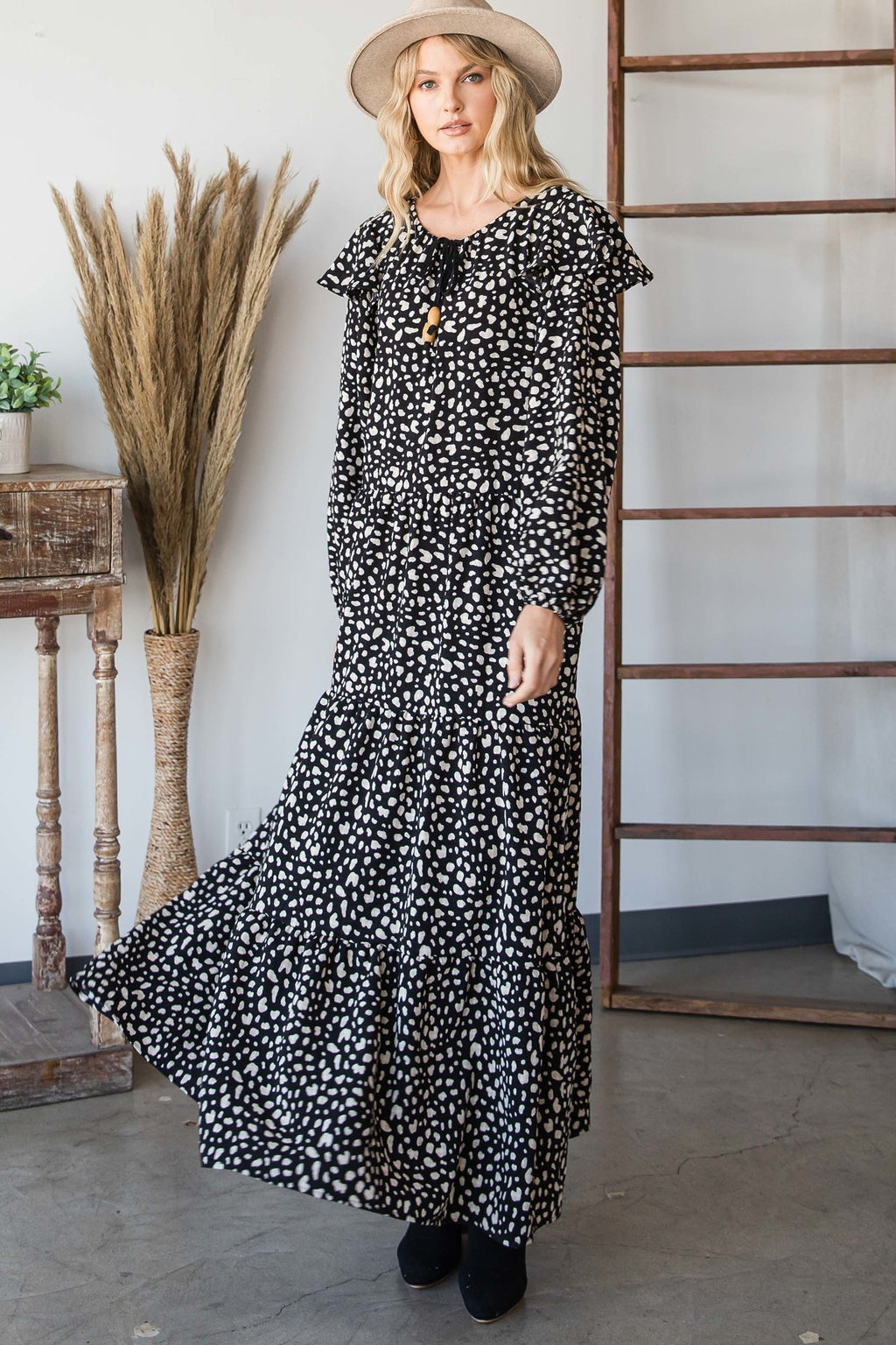 Black/white boho tiered maxi dress with long skirt and ruffled neckline