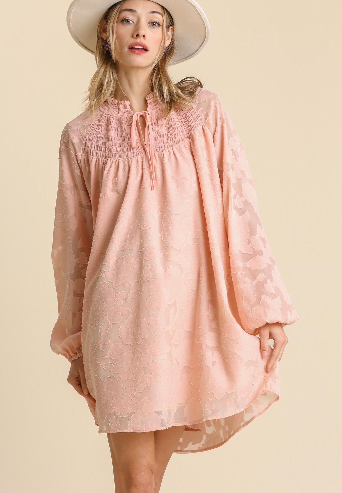 Blush jacquard tie-neck yoke dress with gathered smocked bodice