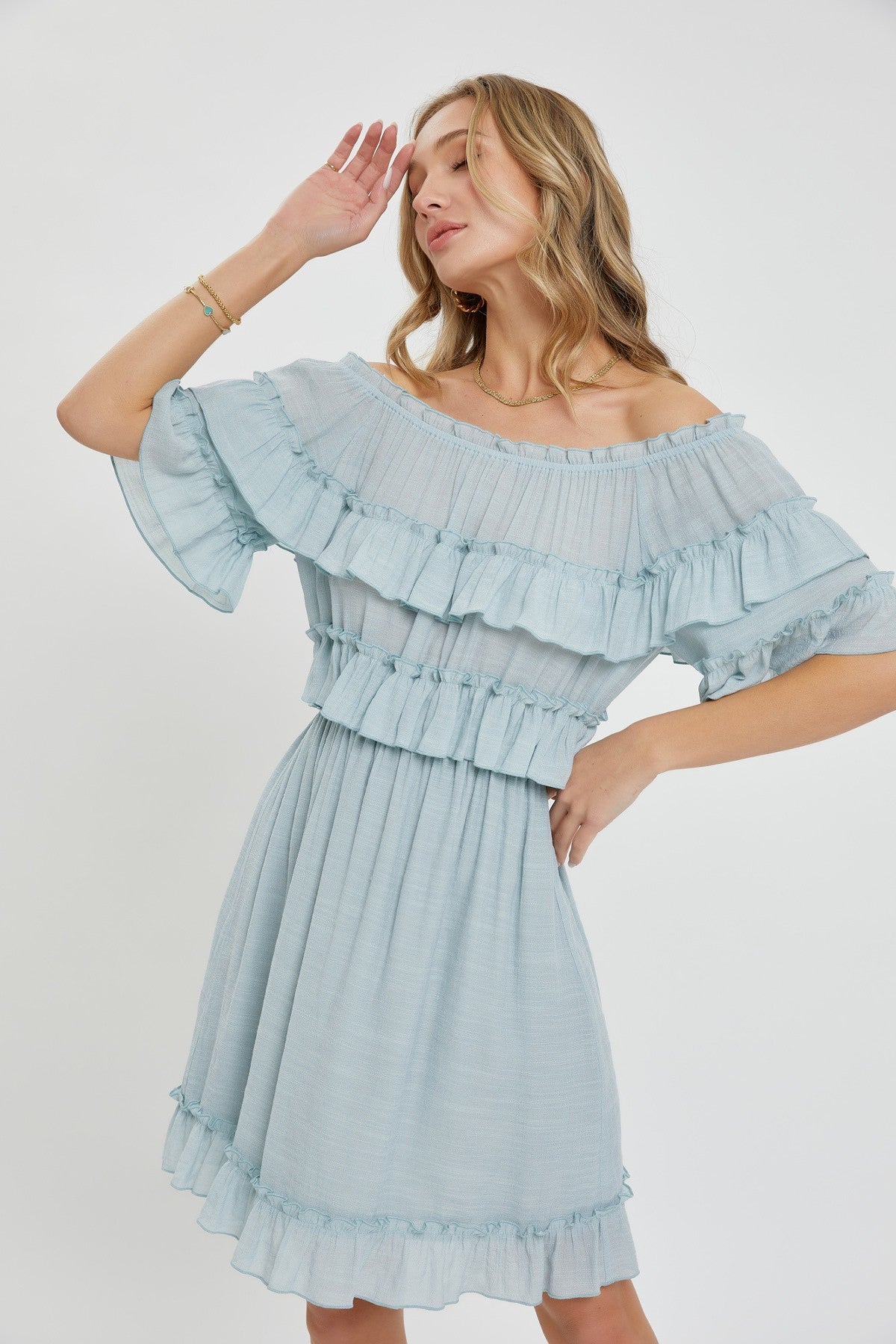 Misty blue off-shoulder dress with layered ruffle bodice and sleeves