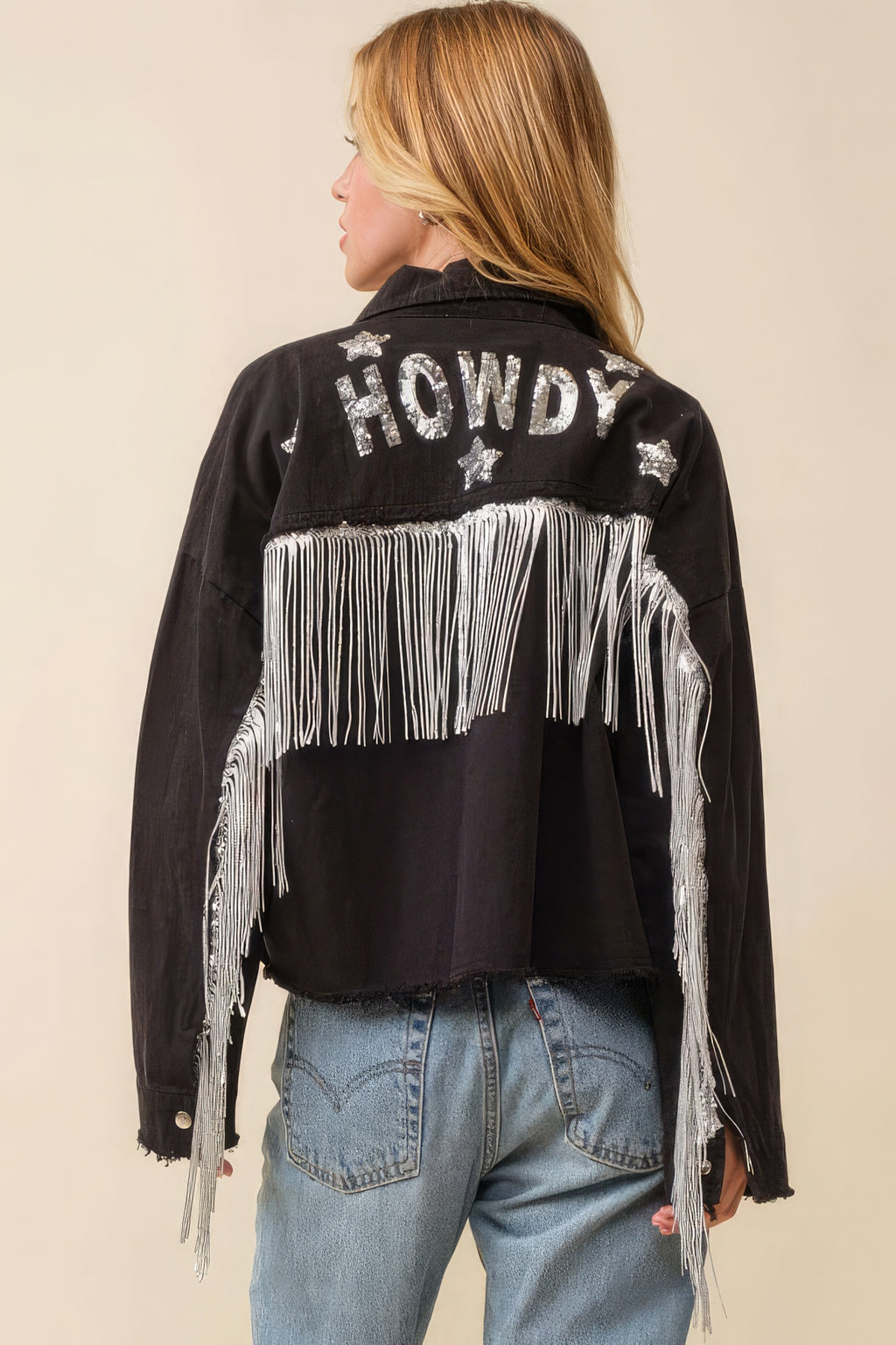 Black Howdy jacket back with “Howdy” and star patches, fringed front band