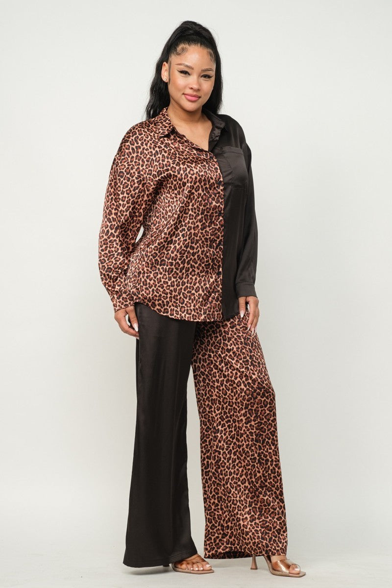 Half leopard-print top and solid black pants set with wide-leg silhouette