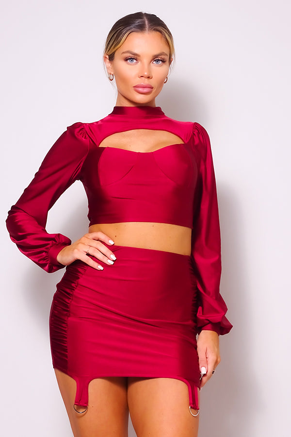 Red cutout turtleneck puff-sleeve top with side-ruched garter mini skirt set