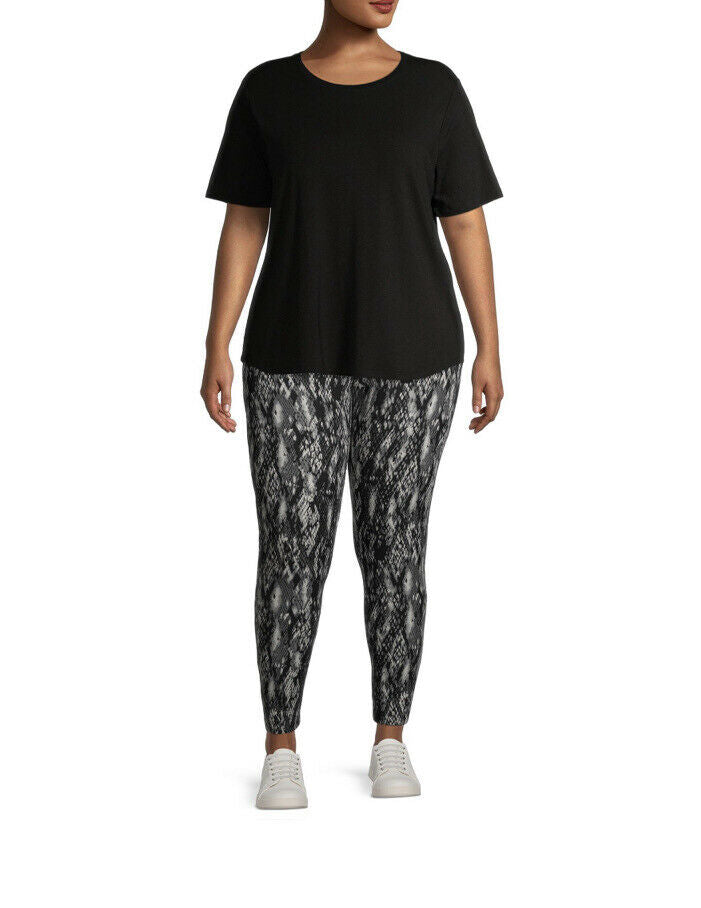 2XL snake-print leggings worn with a black top, tapered ankle fit