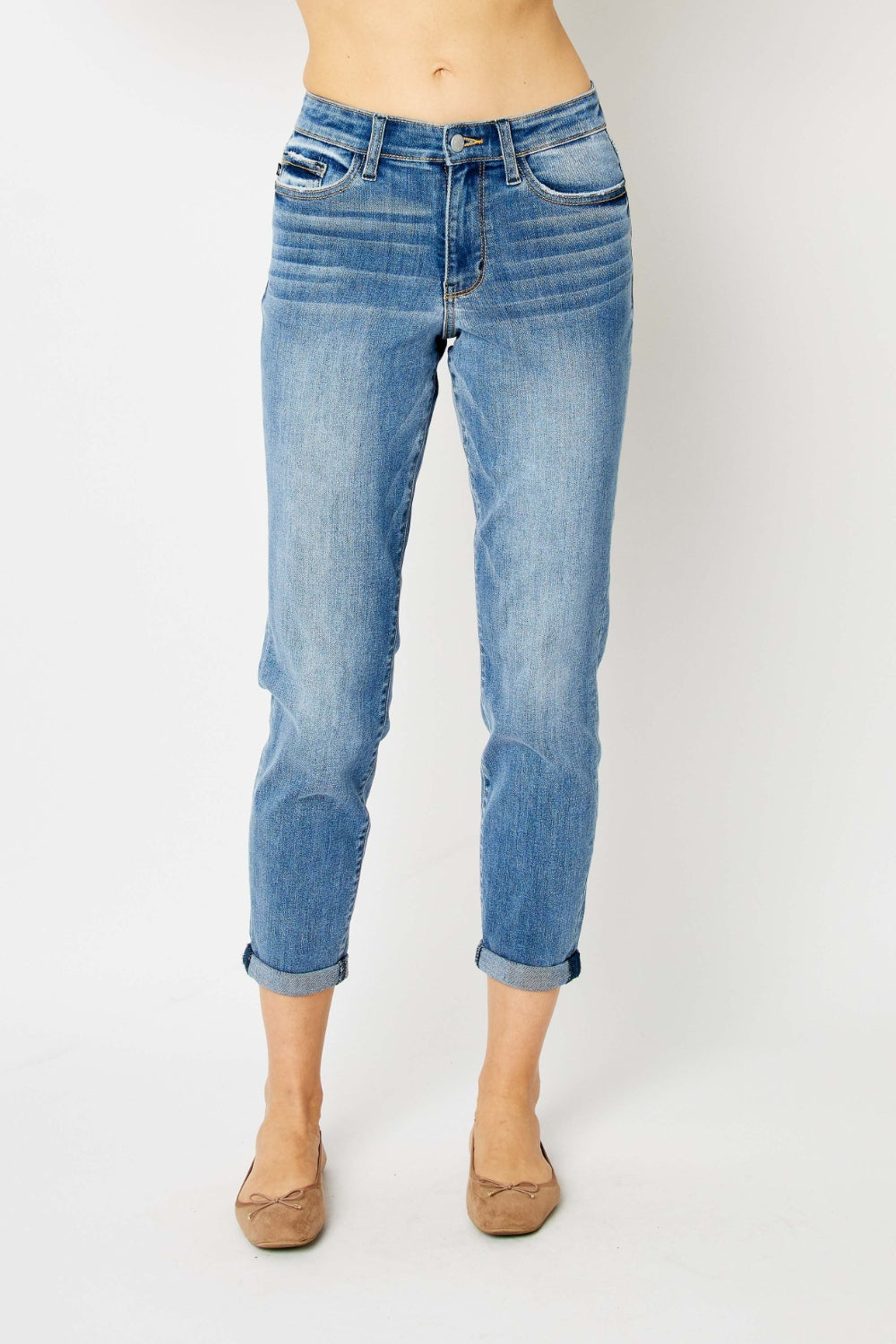 Medium blue slim jeans with cuffed hem, classic five-pocket styling and belt loops