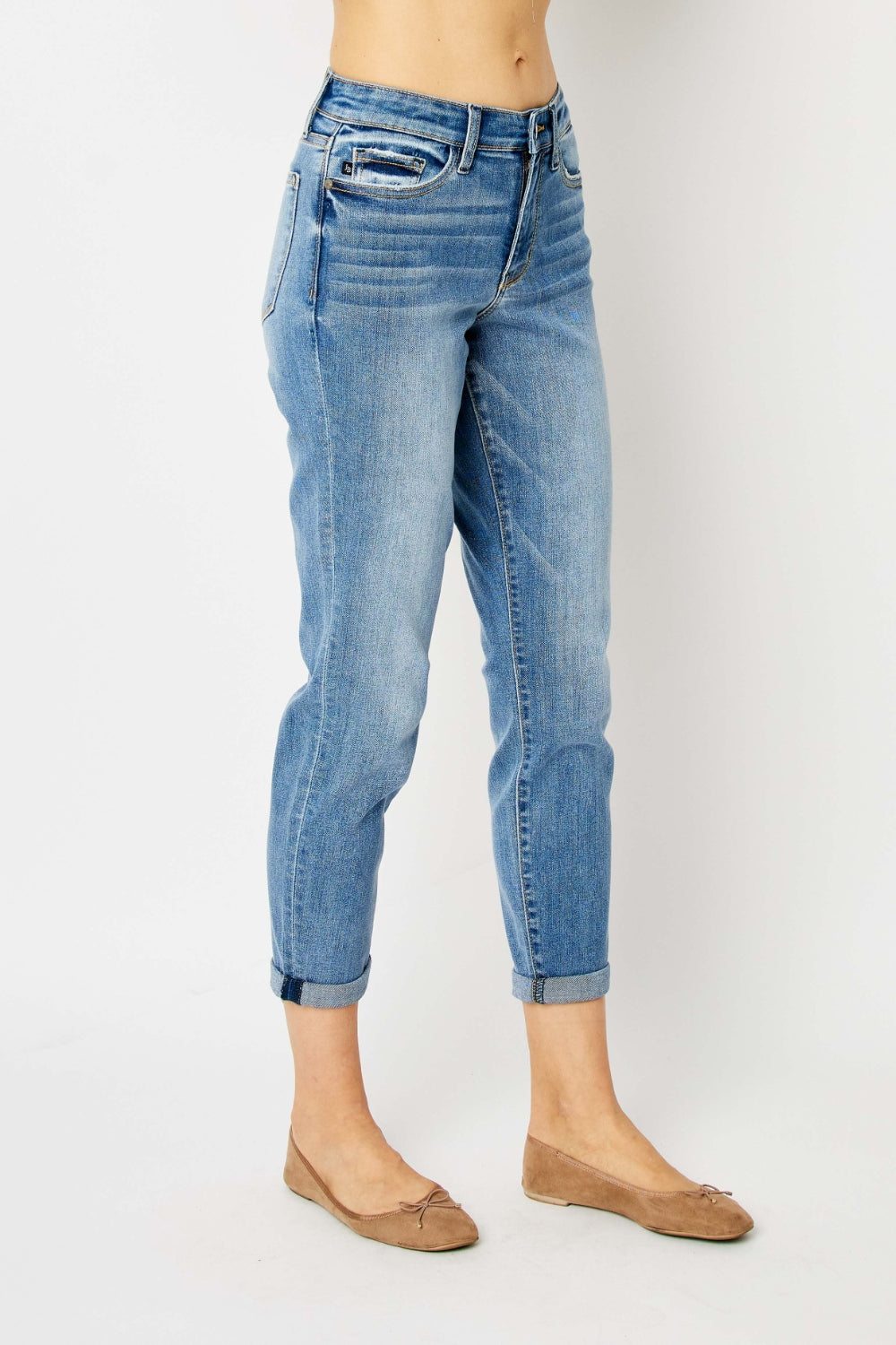 Medium blue slim jeans, cuffed hems, front pockets and belt loops