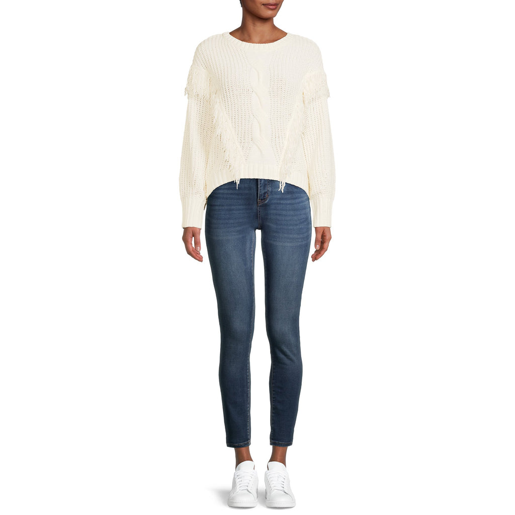 White chenille fringe sweater worn with blue jeans; loose fit, dropped shoulder