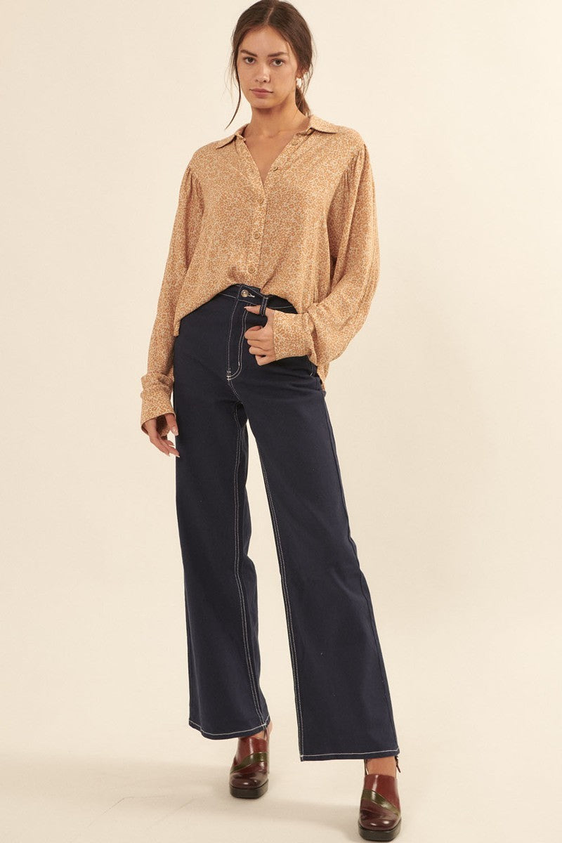 Caramel floral button-front collared shirt, long sleeves, worn with dark jeans