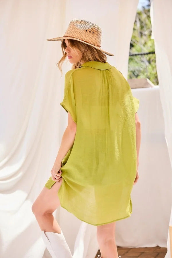 Lime green oversized button-down robe, back view, short sleeves