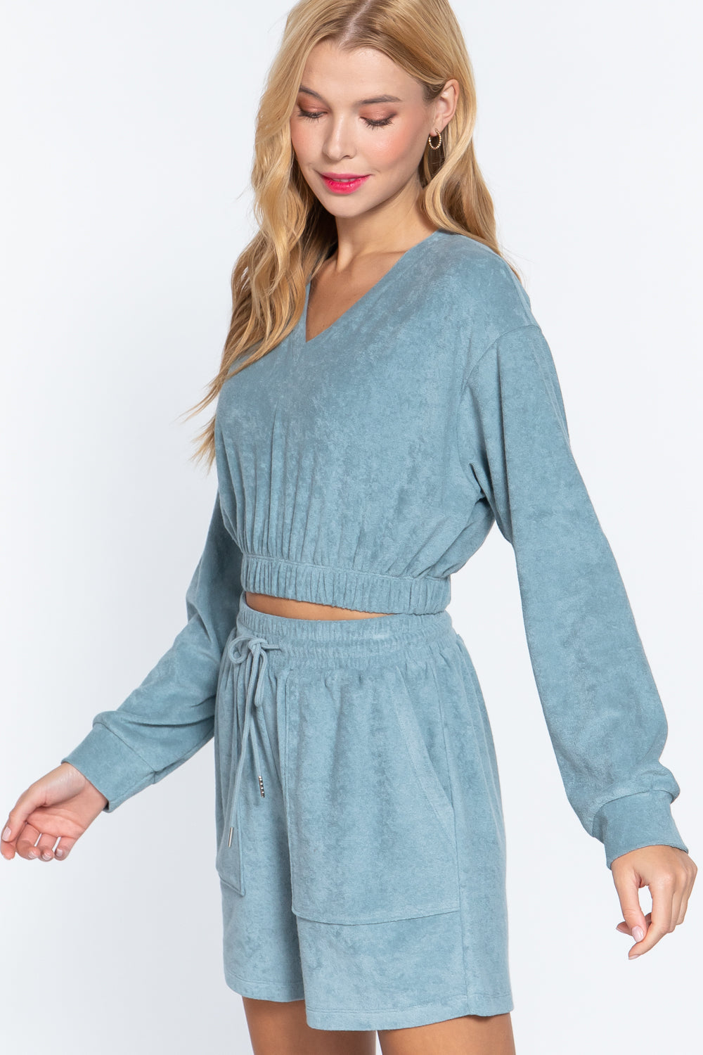 Stone blue terry toweling top, V-neck and elastic waist hem, relaxed fit