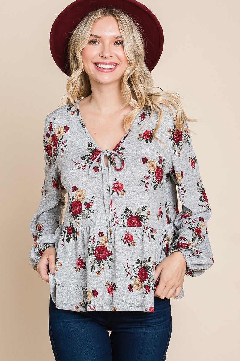 Floral babydoll blouse with tie V-neck and gathered front, grey with rose print