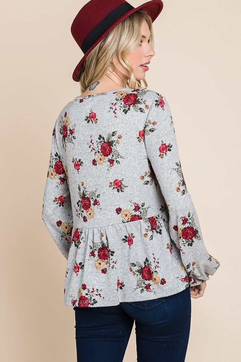 Floral printed babydoll top back view with gathered hem and elastic cuffs, grey