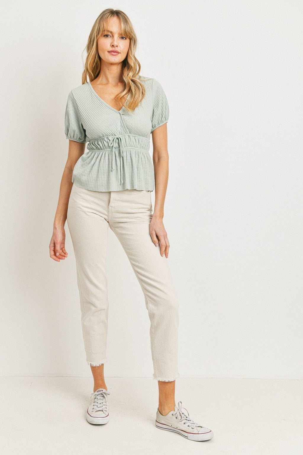 Front waist tie top with cut hem, mint green peplum-style