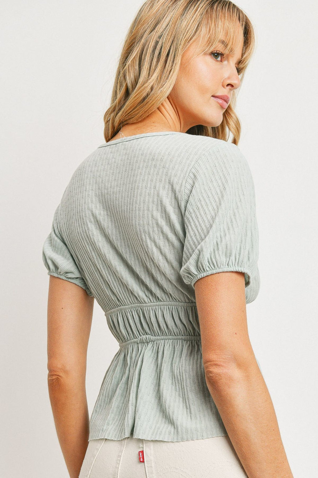 Mint back view waist-tie top with puff sleeves and smocked waist