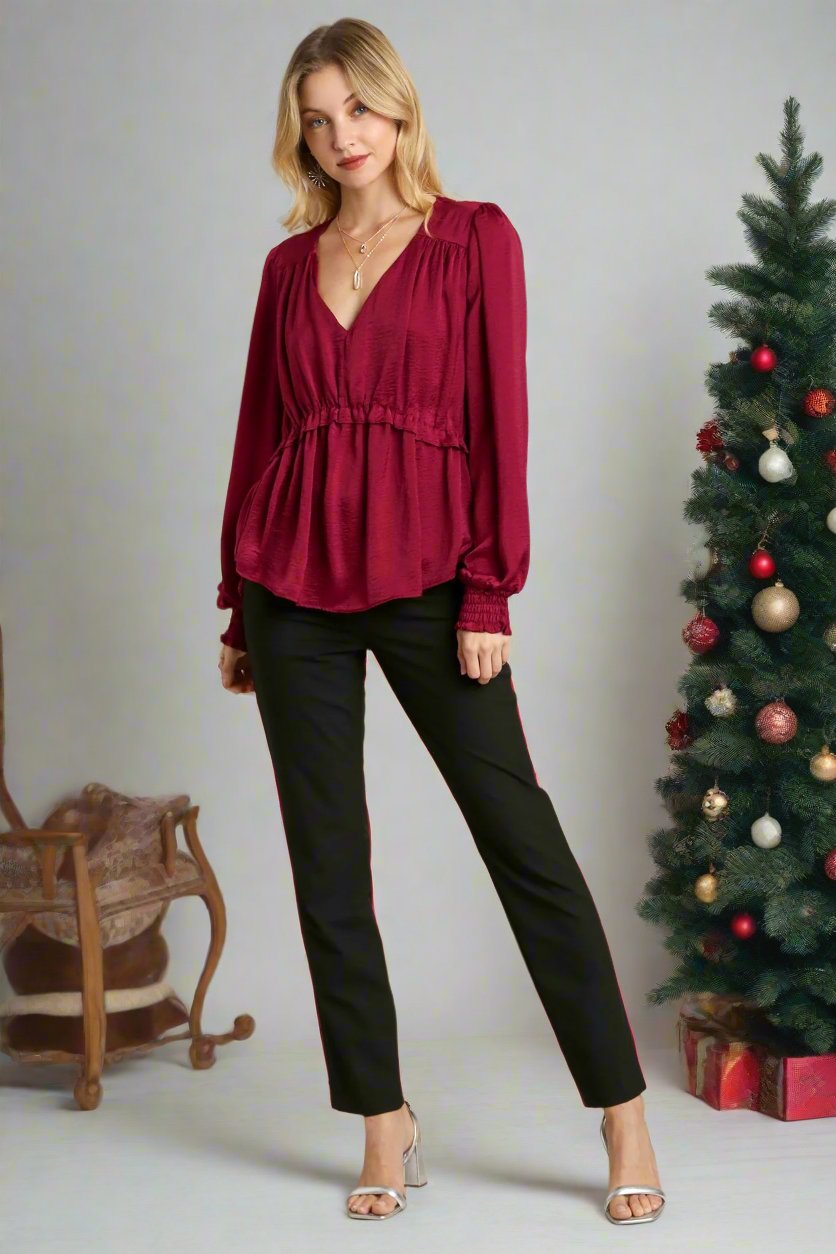 Red satin V-neck baby doll top with ruffle peplum and cuffed long sleeves