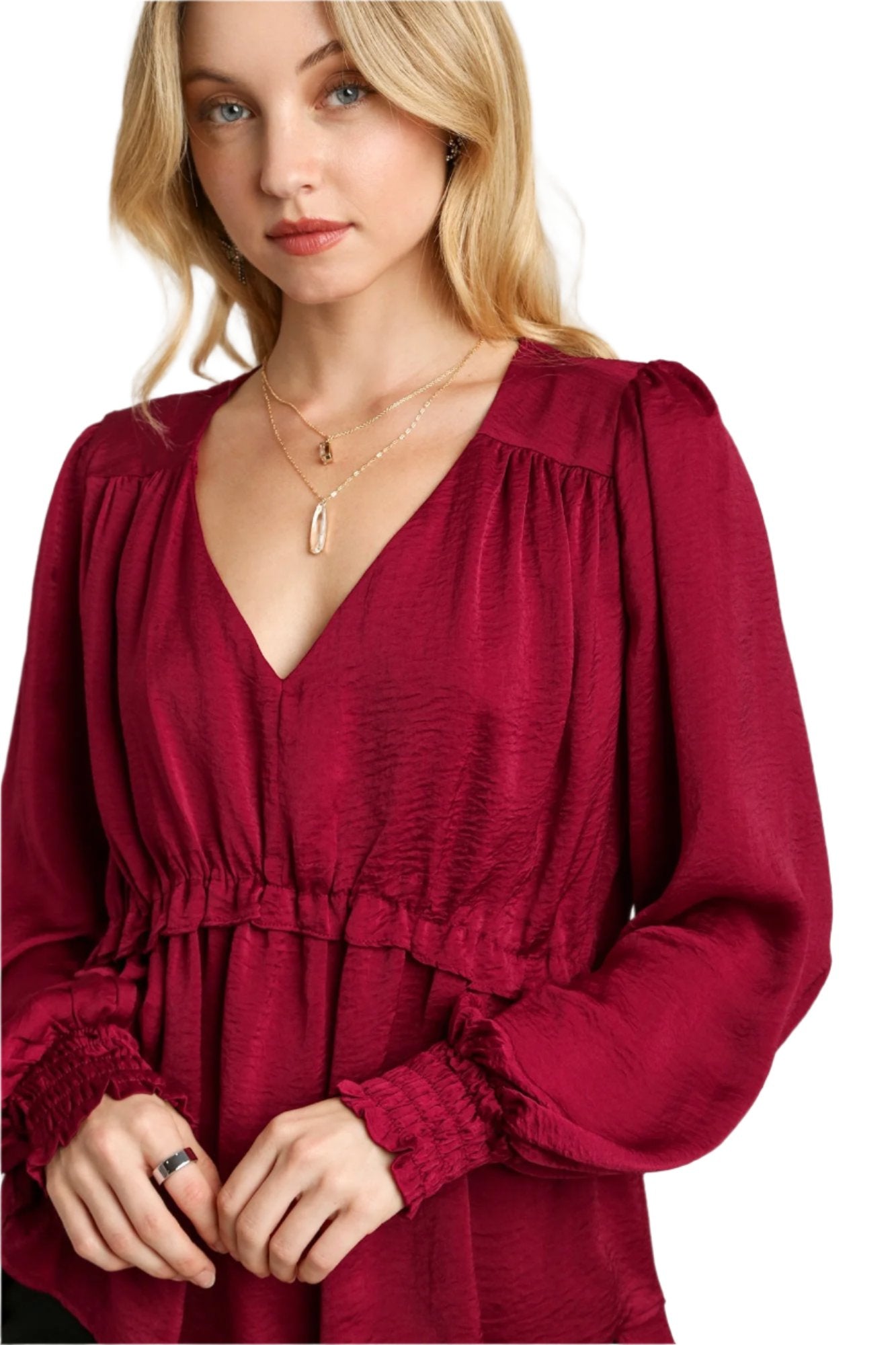 Red V-neck baby doll top detail: ruffled neckline, gathered waist, elastic cuff sleeves