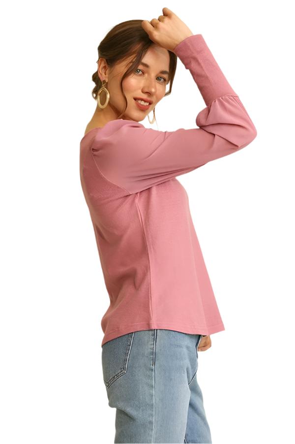 Light mauve long-sleeve top with puff sleeves and gathered shoulder