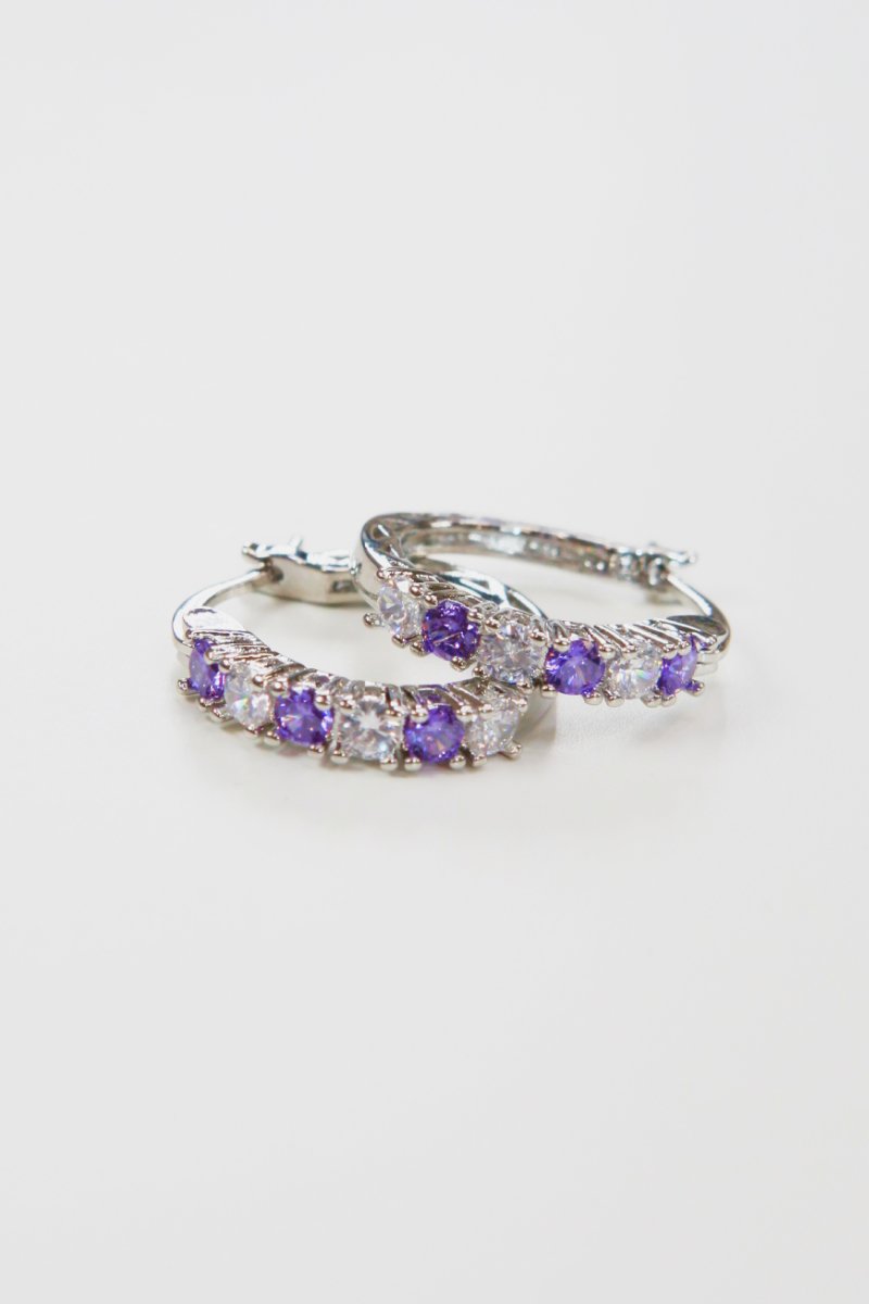 Silver hoop earrings 3/4in with purple cubic zirconia row stones