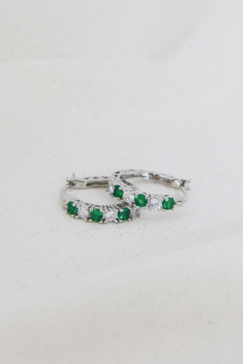 Silver hoop earrings 3/4in with green cubic zirconia row stones