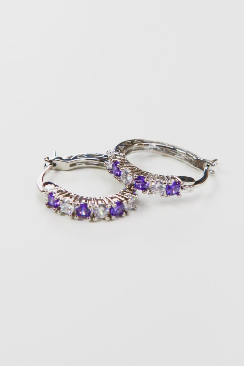 Silver hoop earrings 3/4in with purple cubic zirconia row stones