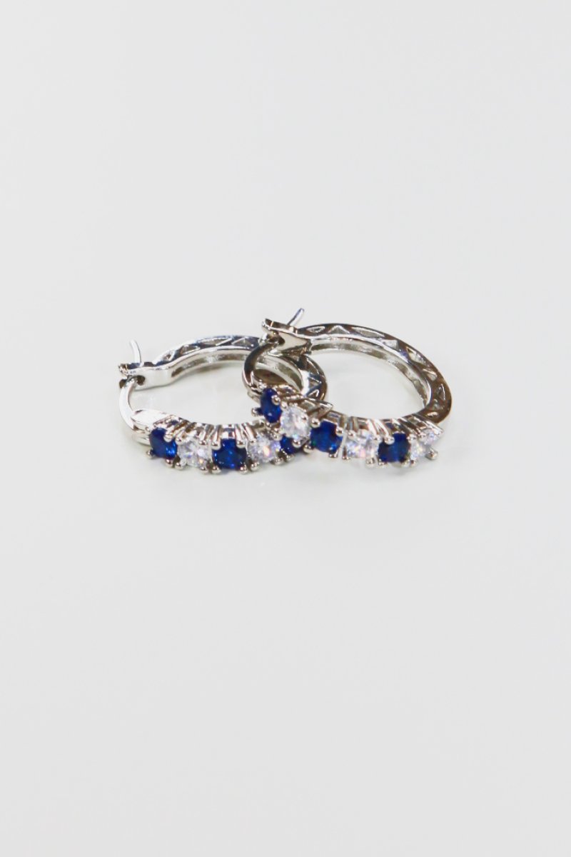 Silver hoop earrings 3/4in with blue cubic zirconia row stones