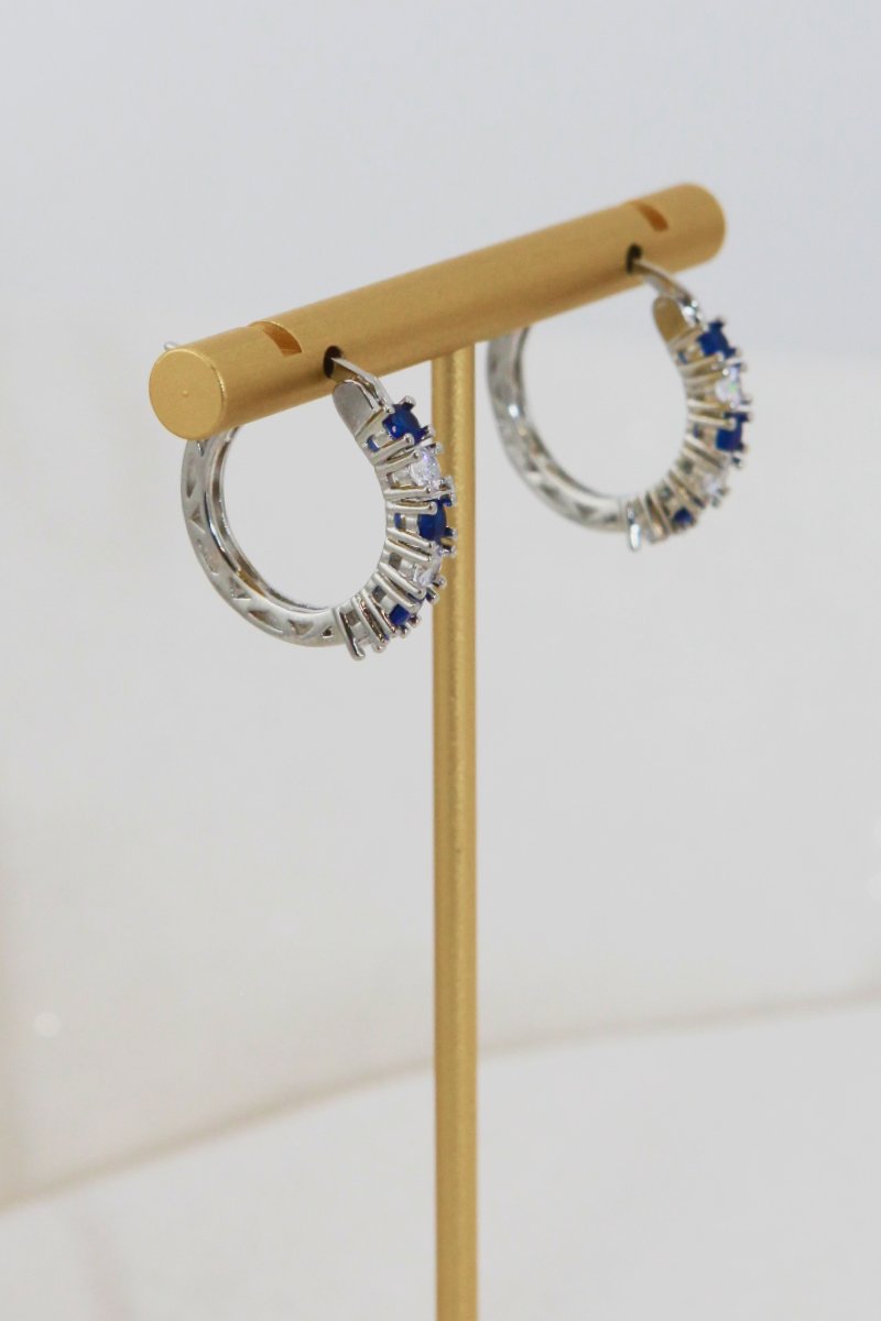 Silver hoop earrings 3/4in with blue cubic zirconia outer row detail