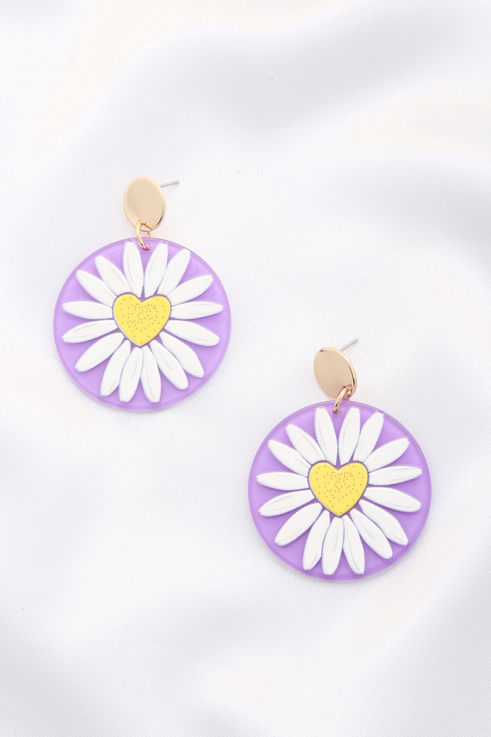 Lavender round daisy print drop earrings with white petals and a yellow heart center