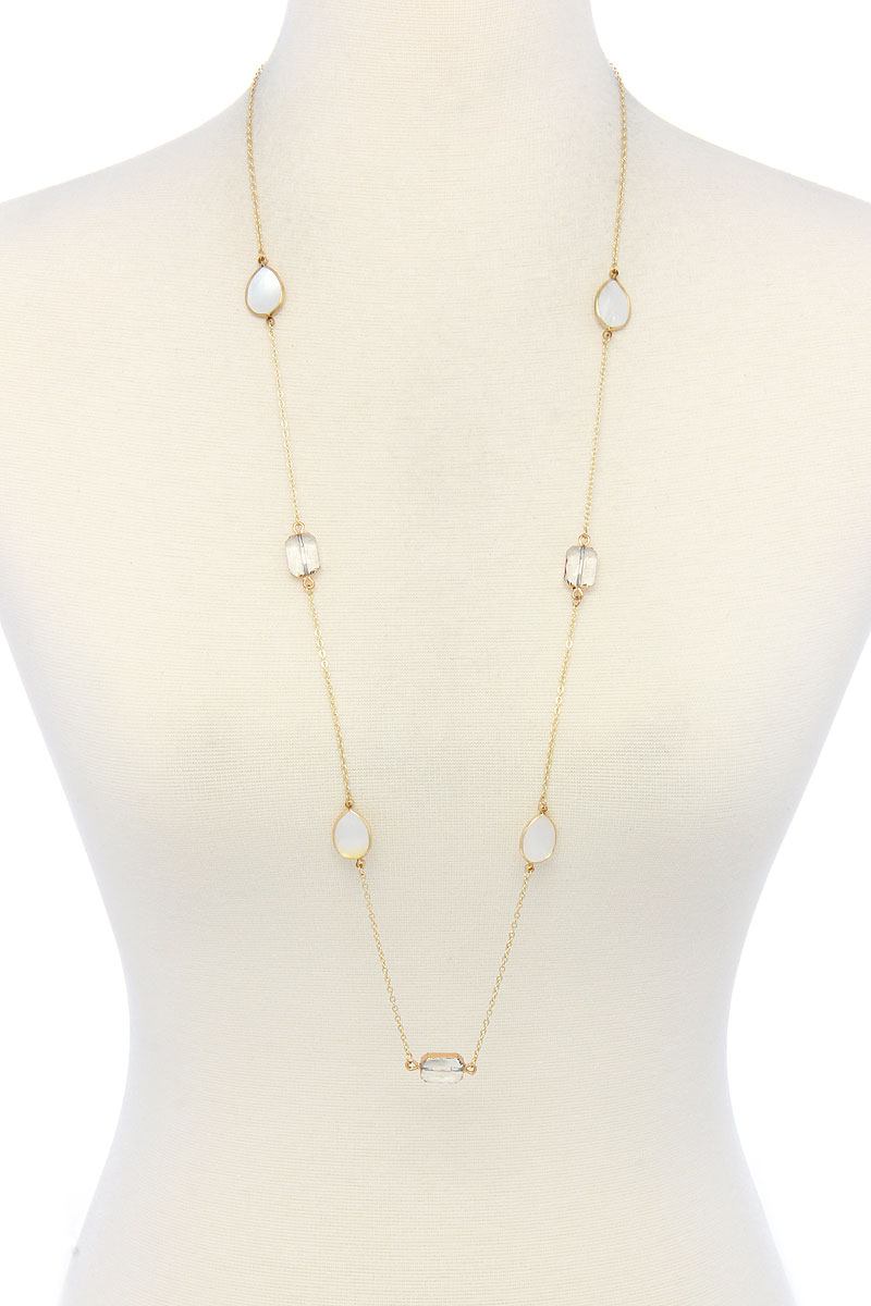 7 Stones Trendy Necklace (Clear) with oval and teardrop stones on a gold chain