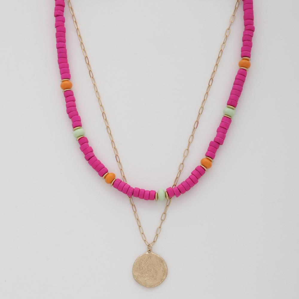 Layered coin bead necklace in fuchsia with round gold-toned pendant