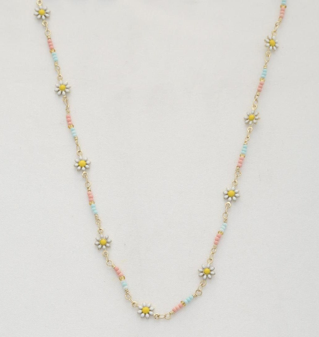 Gold beaded flower necklace with daisy charms and pastel bead accents