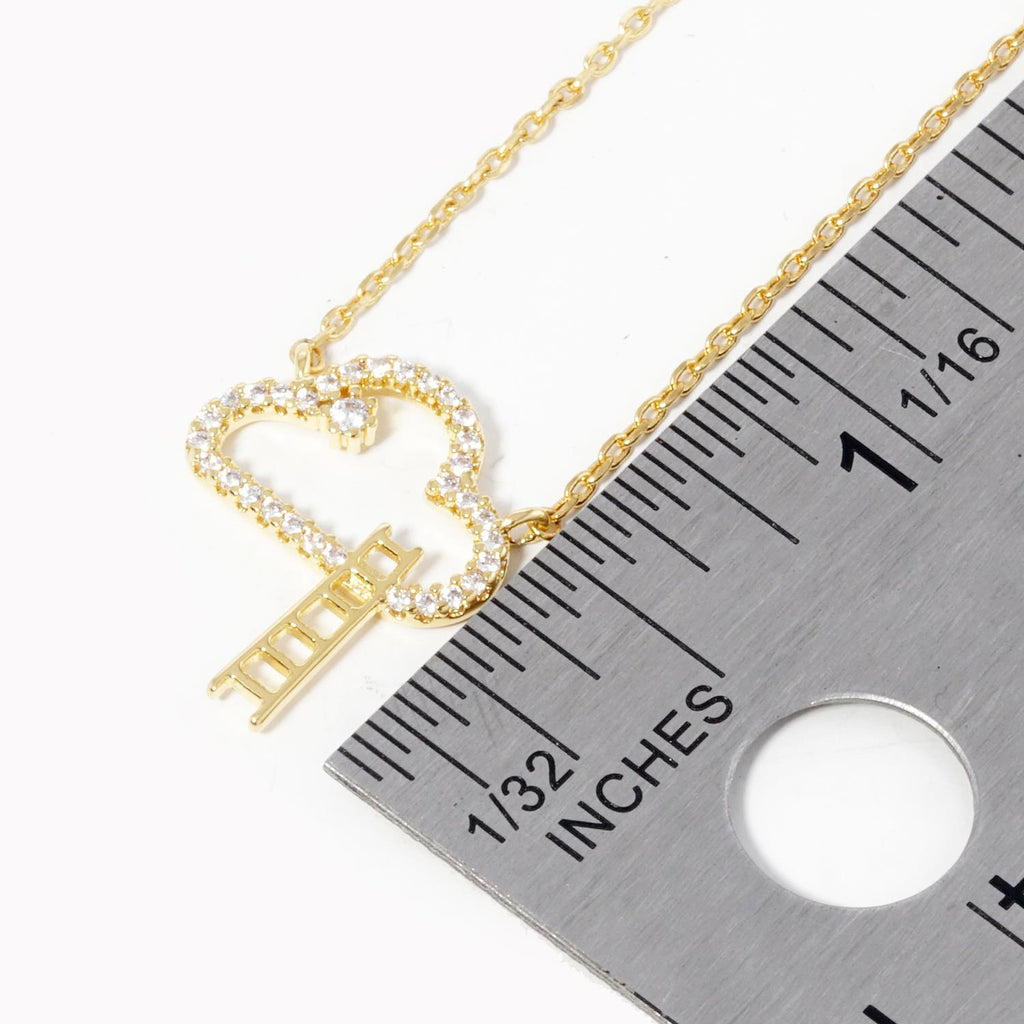 Cloud pendant necklace with rhinestone pavé cloud and vertical ladder charm; gold chain
