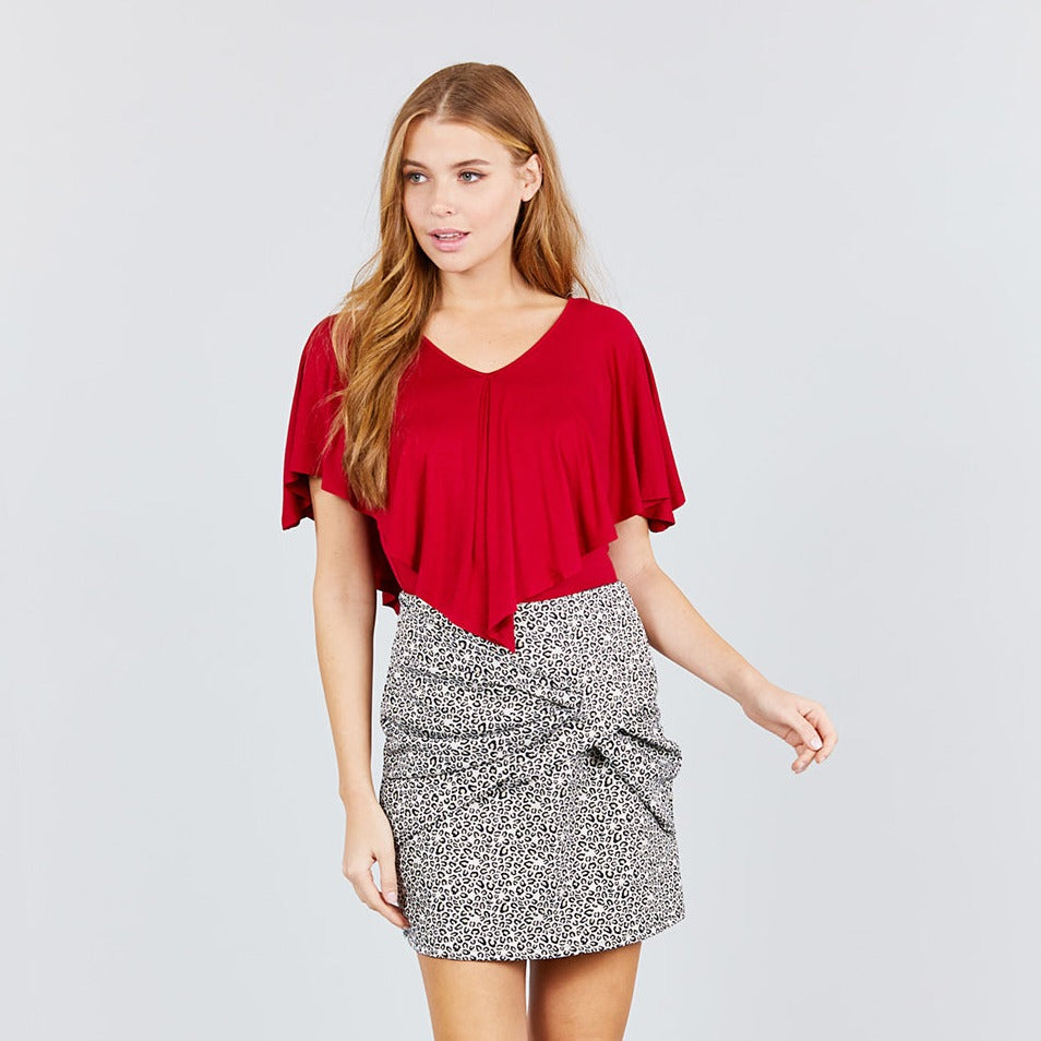 Chili red V-neck flounce top (Juniors M) with short flutter sleeves.
