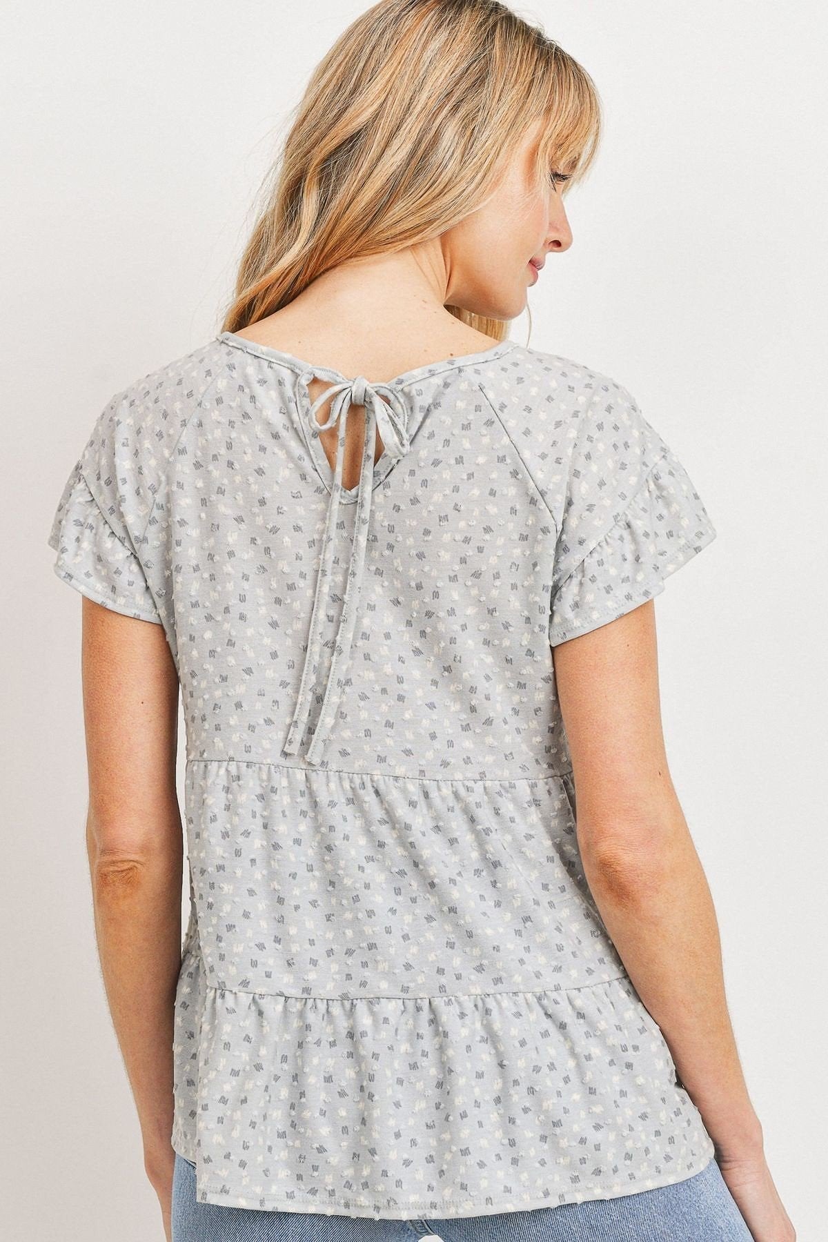 Rücken: Dot-Print Jersey-Top mit Bindeschleife, Rüschenvolants und kurzen Ärmeln