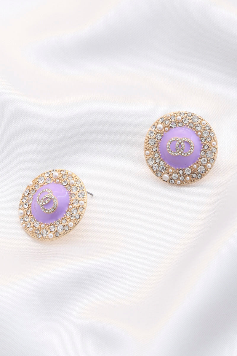 Double circle round metal earrings with lavender center and rhinestone halo